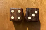 Two dice. The first with the 4 side up, the second with the 3 side up